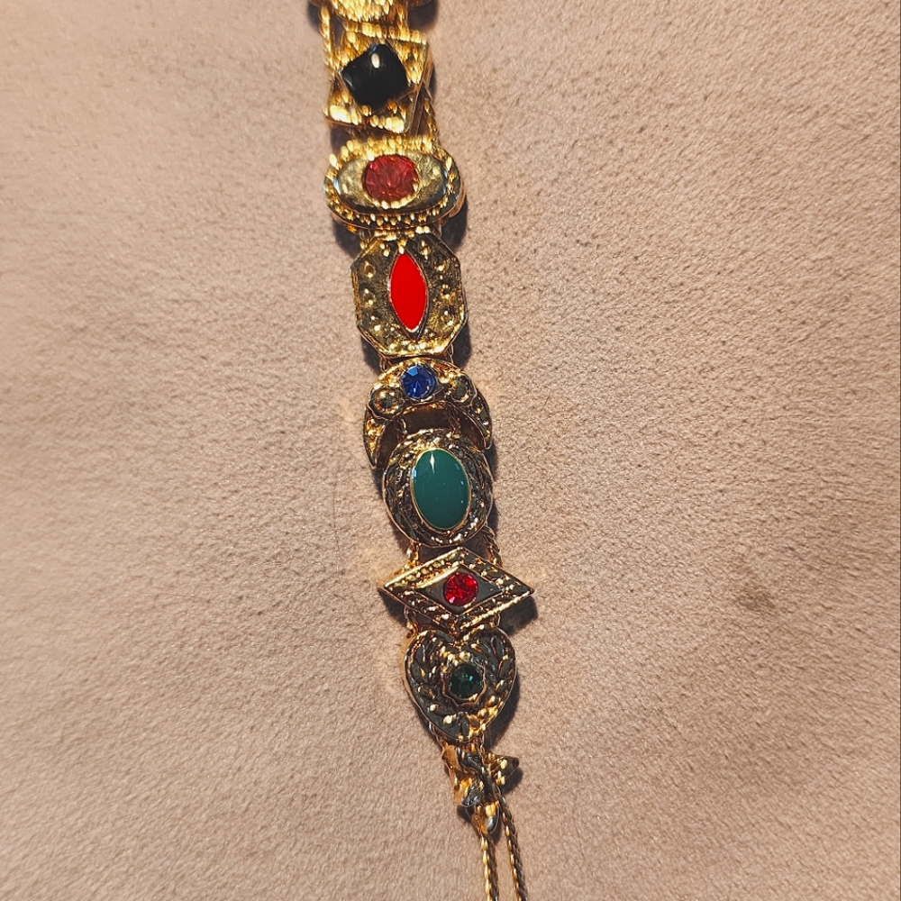 10k gold sliding charm bracelet.